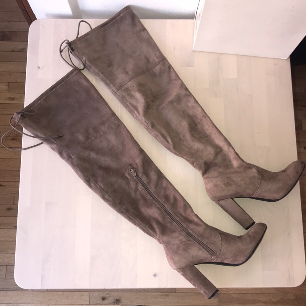 Thigh high heeled boots